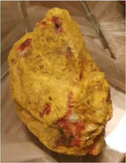 Photo from the official notice: Yellow Orpiment Mineral Bookends sold by TK Maxx — chemical risk