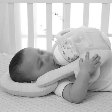 Photo from the official notice: Baby Self-Feeding Pillows / Prop Feeders — health risk