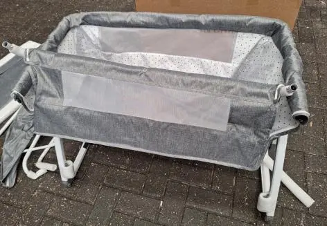 Photo from the official notice: 3 in 1 Baby Bedside Bassinet with Wheels — suffocation risk