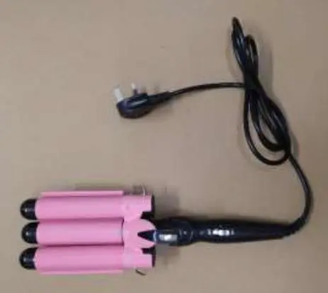 Photo from the official notice: 3 Triple Barrel Hair Salon Curler sold via eBay — electric shock risk