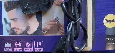Photo from the official notice: Adapter supplied with V-Benz, Diva Beauty, V-6093 Hair Clippers — electric shock risk