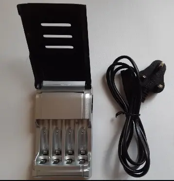 Photo from the official notice: Battery Charger 4 Slots Fast Charger AA AAA Rechargeable Batteries with UK Plug — fire & electric shock risk