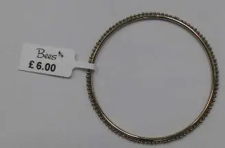Photo from the official notice: Bees Jewellery Hand Chain, Bangle and Earrings — chemical risk