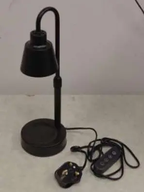 Photo from the official notice: Candle Warmer Lamp sold via Amazon — electric shock risk