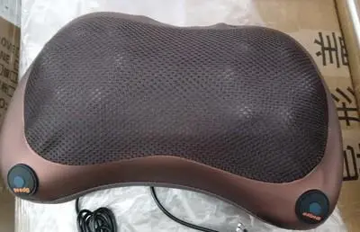 Photo from the official notice: Car & Home Massage Pillow 8028 sold via Amazon — electric shock risk