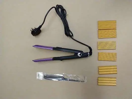 Photo from the official notice: DSHOW 4 in 1 Hair Crimper sold via Amazon — electric shock risk