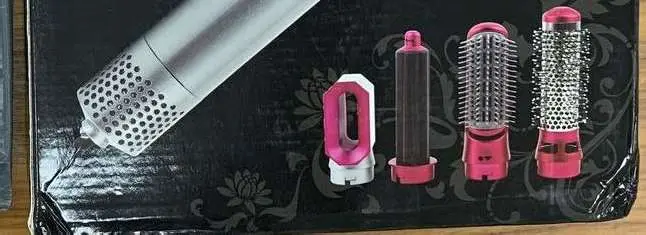 Photo from the official notice: Fashion 5 In1 Hair Dryer Volumizer Brush Hot Air Hair Comb Curling And Wand Straighter — electric shock risk