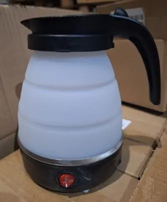 Photo from the official notice: Foldable Travel Electric Kettle — fire risk (2604-0082)
