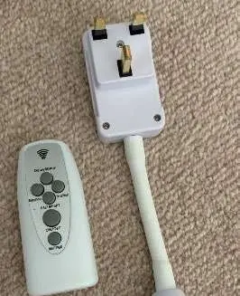 Photo from the official notice: Huahan Haituo UK Plug, AC Power, to E27 LED Bulbs Socket Adapter with Remote Control — electric shock risk