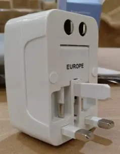 Photo from the official notice: International Travel Adaptor — electric shock risk