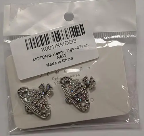Photo from the official notice: MOTONG Heart-Shaped Planet Silver Earrings sold via Amazon — chemical risk