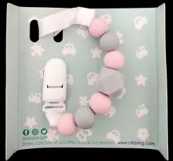 Photo from the official notice: Nibbling Silicone Dummy Clip - Geo — choking risk