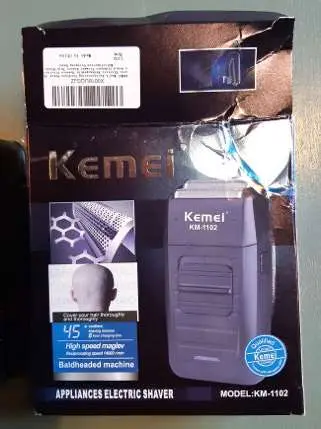 Photo from the official notice: Plug Adaptor supplied with Kemei Electric Shaver — electric shock risk