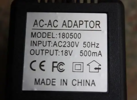 Photo from the official notice: Power Adapter, 180500 — electric shock risk