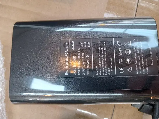 Photo from the official notice: Siker Laptop Replacement AC Adapter — electric shock risk