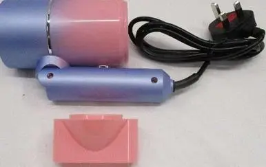 Photo from the official notice: Small Caring Hairdryer — electric shock risk