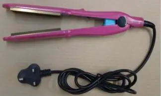 Photo from the official notice: Titanium Hair Crimper sold via eBay — electric shock risk
