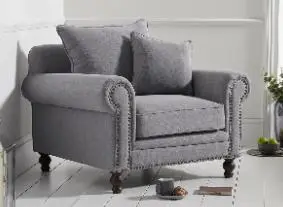 Photo from the official notice: TS-branded Upholstered Sofas and Chairs sold by Mark Harris Furniture Ltd — fire risk