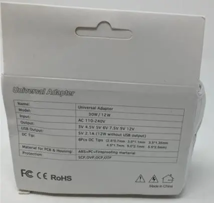 Photo from the official notice: Universal AC/DC Adapter 30W / 12W sold via Wish — electric shock risk
