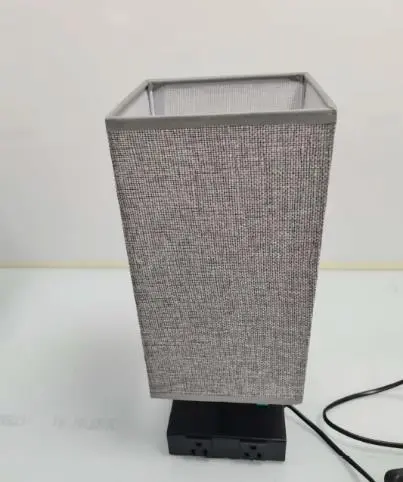 Photo from the official notice: USB Bedside Table Lamp with 2 USB Fast Charging Ports sold via Fruugo — electric shock risk