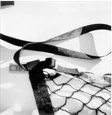 Recalled JumpSport trampoline safety net strap