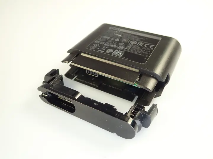Detached casing of recalled Dell Hybrid Power Adapter sold with Dell Power Banks.