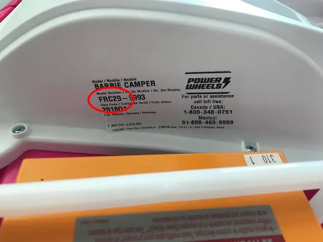 Close up of the label with the model number under the hood