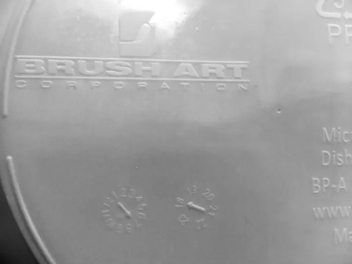 Back of WIC Nutrition Plate – Brush Art logo and date code