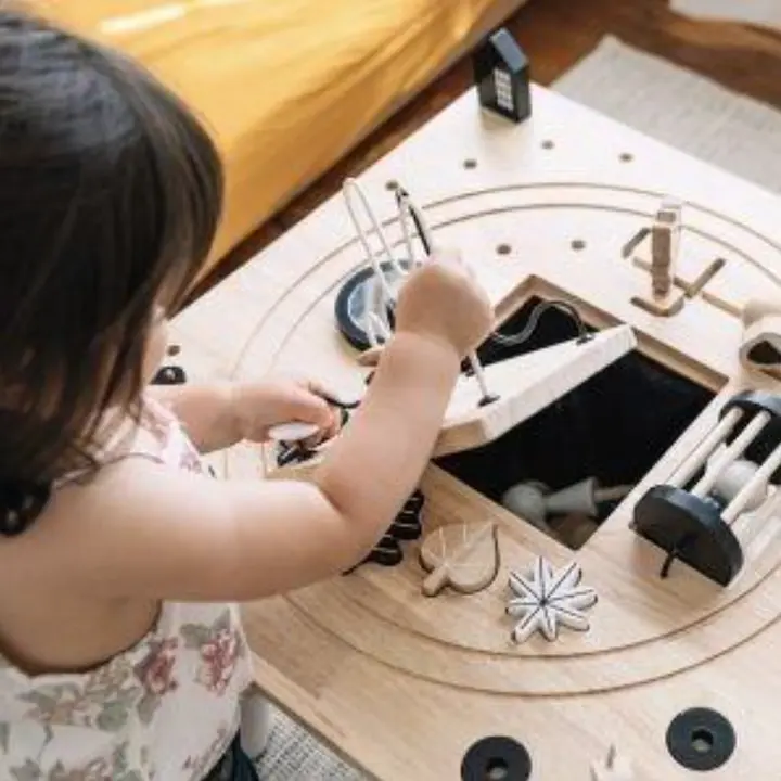 Recalled Wonder & Wise-branded activity table - showing storage pouch