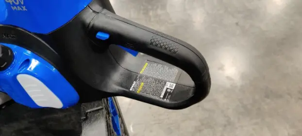 Label with model and date code on recalled Kobalt Brand 40-volt Lithium Ion Cordless Electric Chainsaw