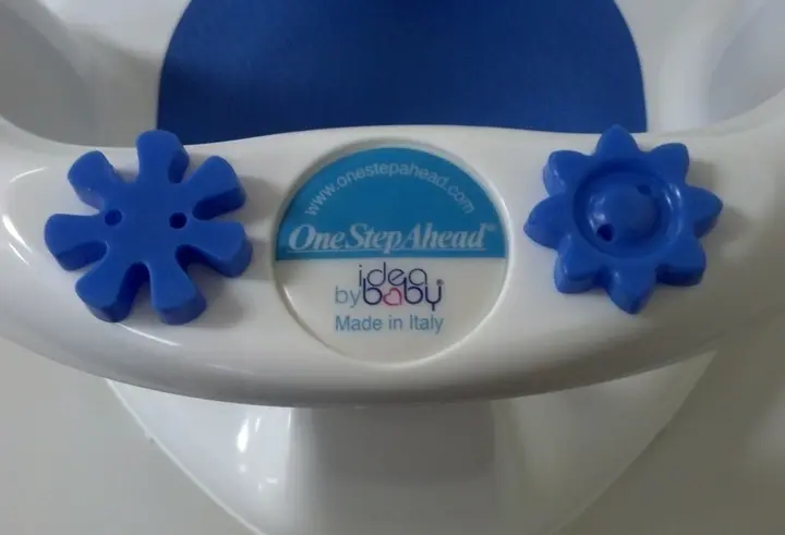 The web address "www.onestepahead.com" appears on the One Step Ahead model of the Idea Baby bath seat.