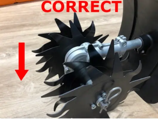 Properly assembled mini-cultivator attachment with the gearbox mounted so that the axle is below the drive tube.
