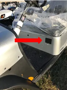 Red arrow marking the location of the serial number on the driver's side