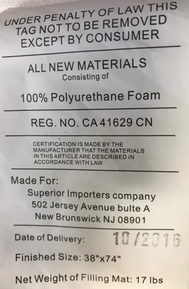 Mattress tag located on the top side near the foot of the mattress
