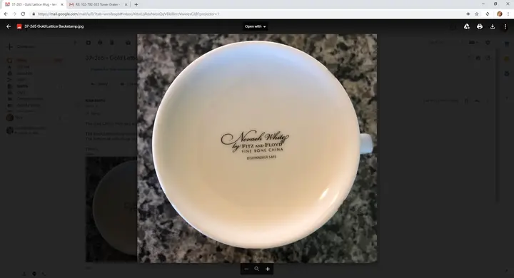 Label on the underside of the Fitz and Floyd Nevaeh White Can Mug in Gold