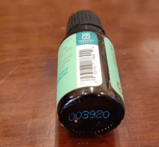 Location of lot code on the bottom of the bottle