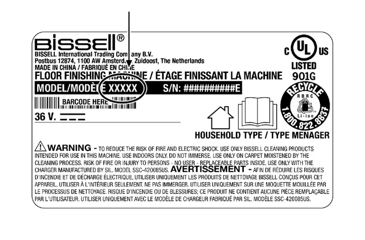 A close up of the product rating label behind the dirt tank. The arrow is pointing to the model number