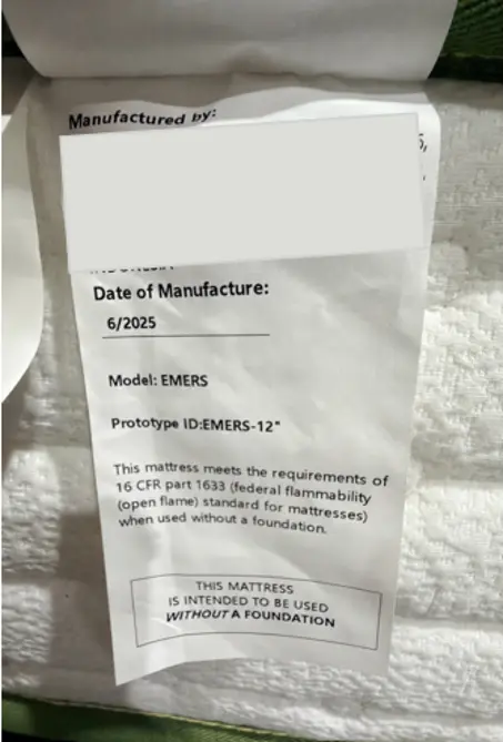 "Prototype ID: " and the manufacture date "6/2025" are printed on a sewn-in white label located on one side of the mattress