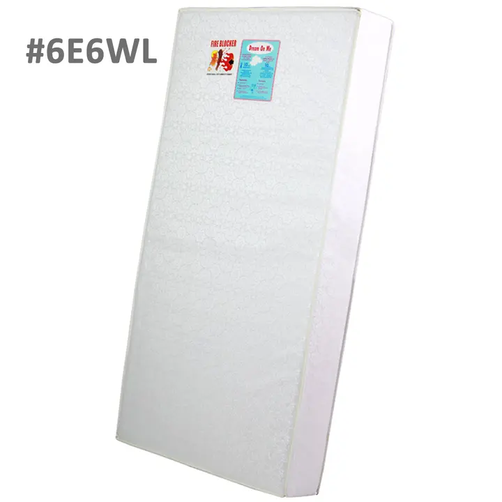 Firm foam crib and toddler bed mattress in white print