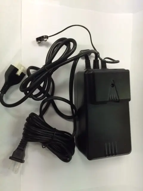 Power supply with cover attached
