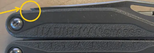 An exposed blade tip protruding from the handle