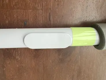Light mount located below the grip handle on the recalled bed rails