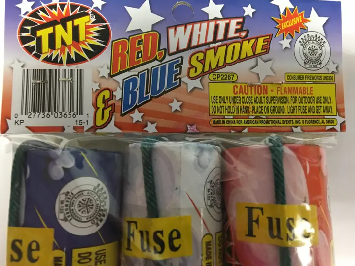 The TNT logo, "Red, White, & Blue Smoke" and UPC number 027736036561 appear on the packing