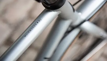 Model name is located on the top tube of the bicycle frame, behind the handlebars and the stem.