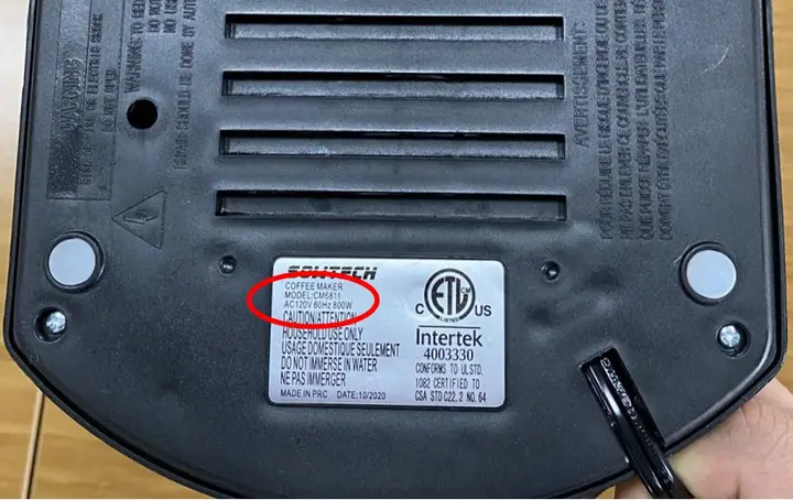 Bottom of recalled SOWTECH Espresso Machine with label displaying "Model CM6811"
