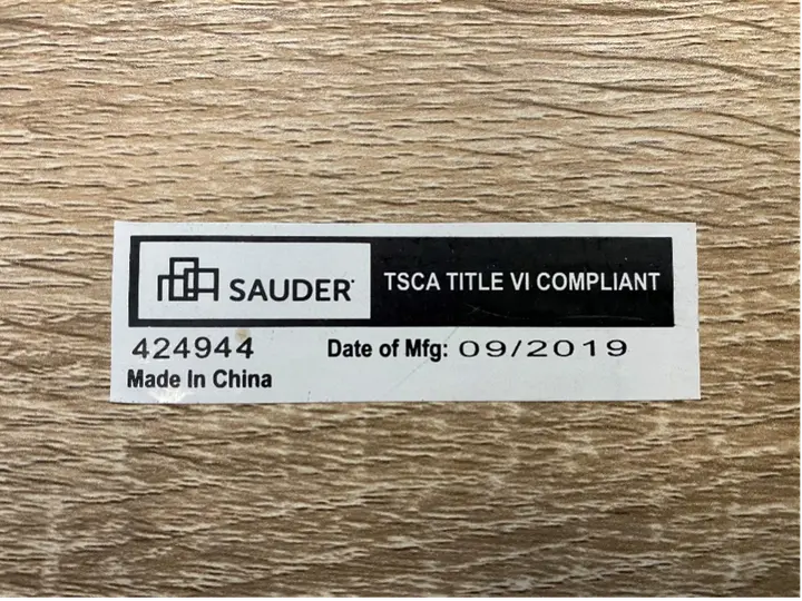Label with the manufacturing date code located on underside of the seat
