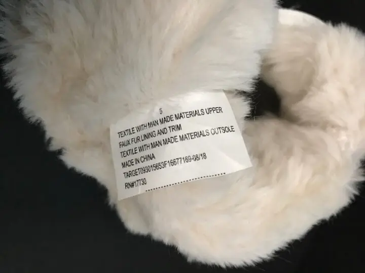 Recalled Cat & Jack "Chiara" Boots inside tag with item number.