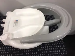 Warning Sticker on Recalled BATTOP Foldable Infant Bath Seats