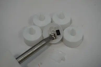 Each of the recalled Besslly tea lights has three preinstalled button cell batteries