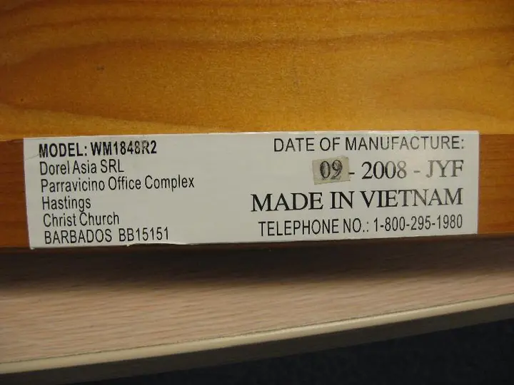 Example of a label found on one of the side rails. Not all labels will identify "Dorel Asia SRL" in the text